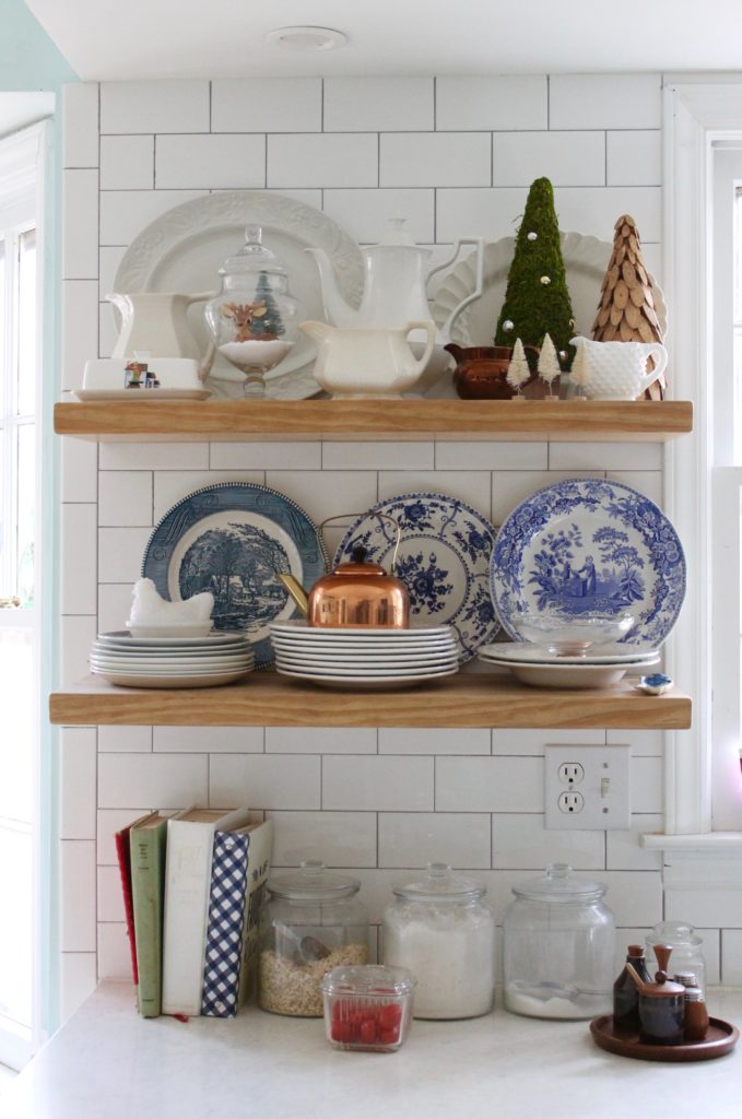 open shelves with subway tile