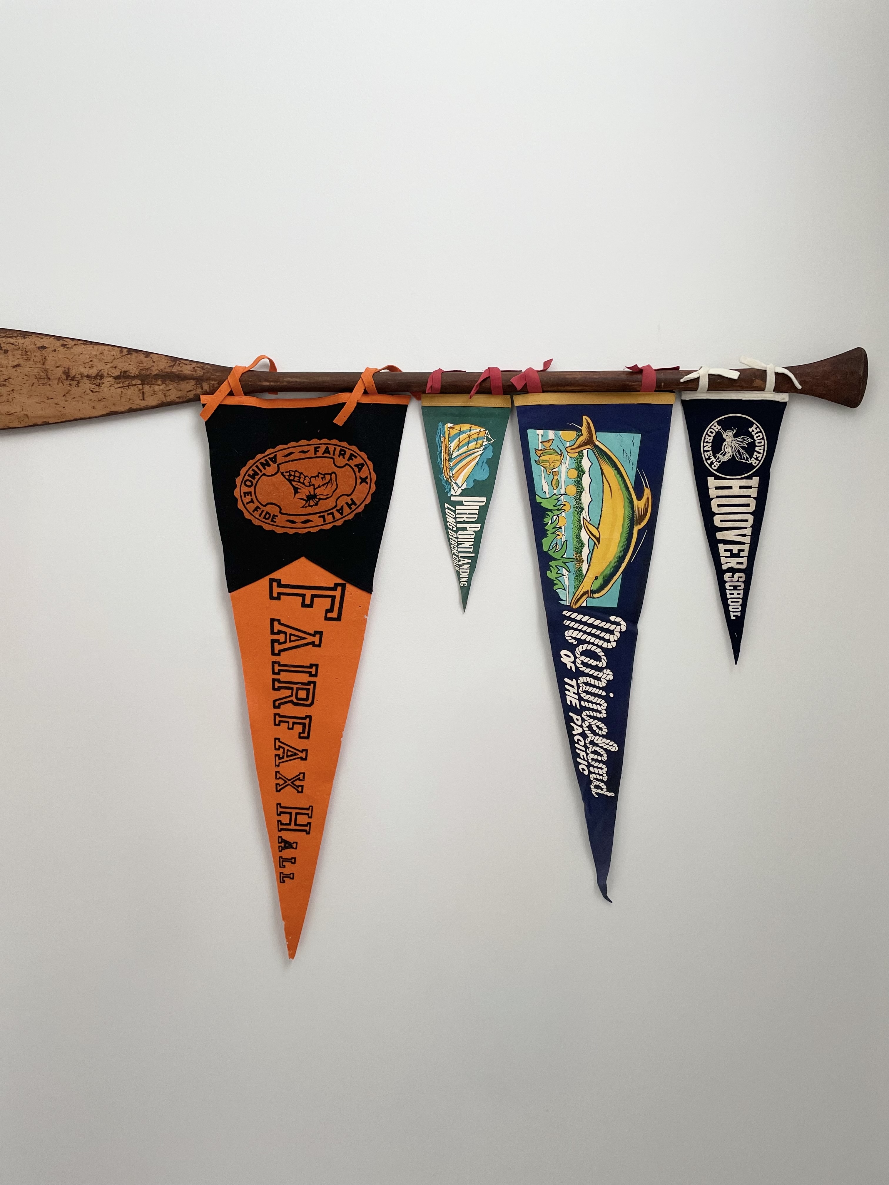 pennants displayed on an oar